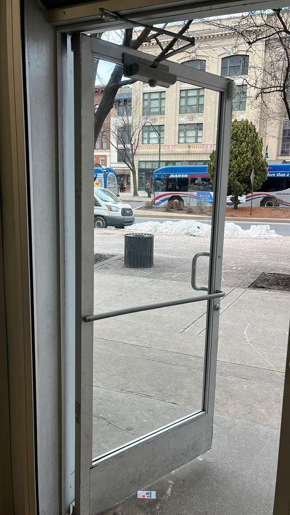 Commercial door closer repair on storefront entry