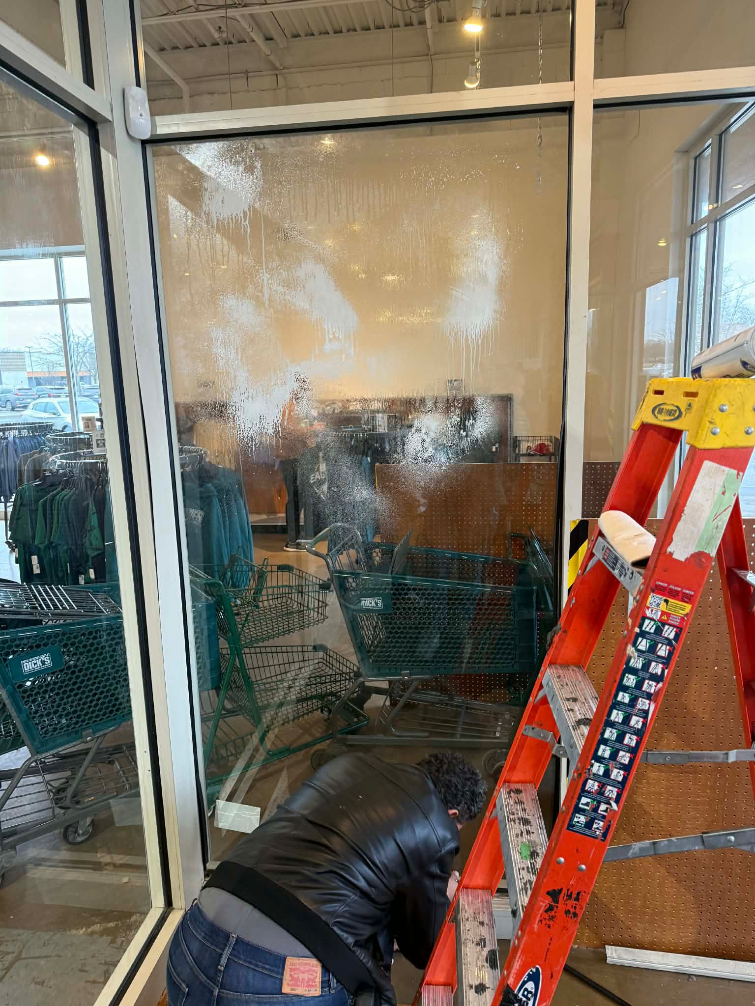 Commercial door hardware repair in progress
